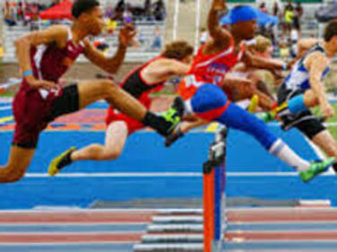 6 athletes jumping over hurdles, assorted colours of clothing
