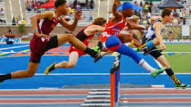 6 athletes jumping over hurdles, assorted colours of clothing