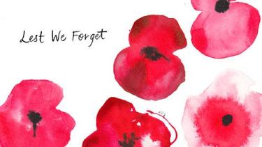 Lest We Forget written on a white background small letters beside water colour poppies