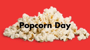 Popcorn Day written in black on top of a pile of popcorn with a red background