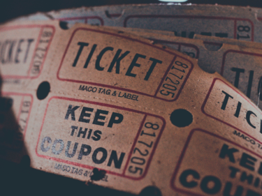 A bunch of brown raffle tickets