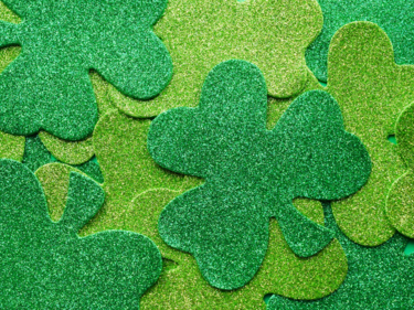 Glitter Shamrocks piled on top of each other, light and dark green