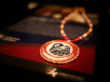 Indigenous symbol necklace for award assembly