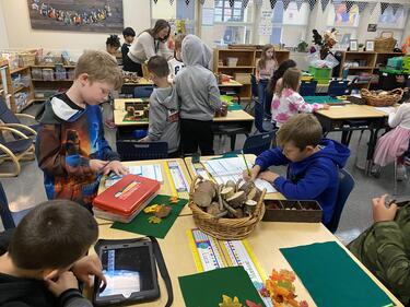 Students working within the classroom