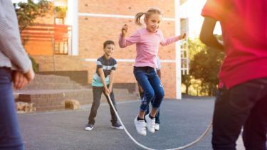 Elementary Students jumping