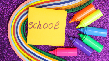 School on stickynotes with rainbow  and colourful felts