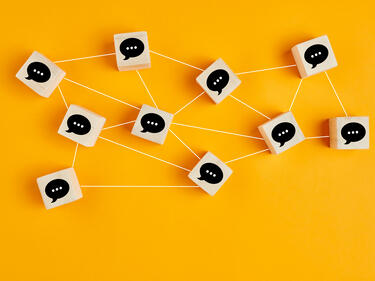 Concept of online communication - wooden cubes