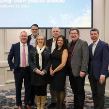 Board of Education and Superintendent pose for a group photo