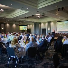 All attendees for the retirement dinner sitting at their tables