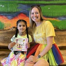 Elementary Student with Teacher posing for School Rainbow Spirit Day 