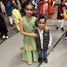 Elementary Students celebrating Diwali in School gym dancing