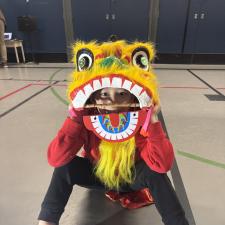 Student Dressed as Dragon for Lunar New Year Assembly