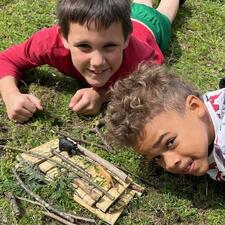 Elementary Students participating in outdoor classroom day on school field