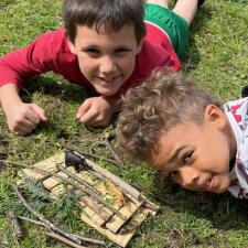 Elementary Students participating in outdoor classroom day on school field